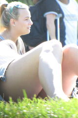 Public voyeur upskirt, of a chick on the grass